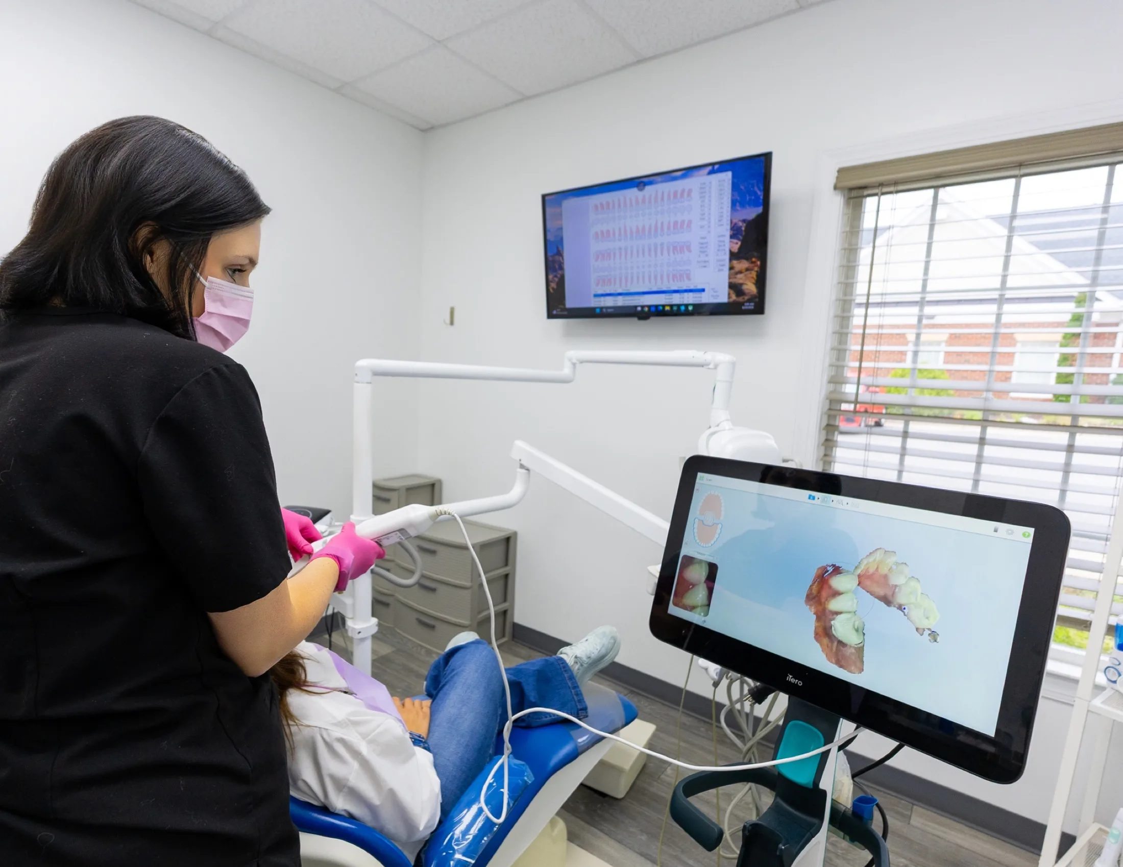 A team member taking a digital scan at Advanced Dental Care of Fredericksburg